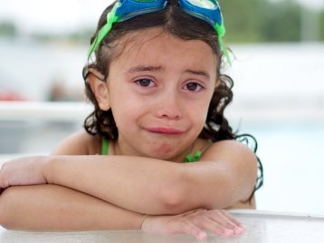crying swimmer girl